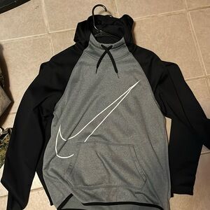Black and gray athletic Nike hoodie medium